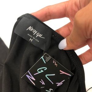 Nasty Gal Tops - NWT Nasty Gal Black One Bell Sleeve Flowy Top Nasty Gal Tops - NWT Nasty Gal Black One Bell Sleeve Flowy Top